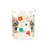 Clear glass tumbler depicting colourful Day of the Dead sugar skull, heart, and floral patterns.
