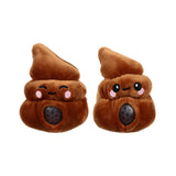 Two brown plush poop fidget toys, each with an embroidered happy face and pink cheeks, featuring a black spotted squeeze ball visible in an oval cut-out on the front.