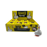 Angled view of a yellow retail display box featuring 'Stretchy Duck You' fidget toys, alongside one individual white stretchy duck toy with an orange beak and feet.