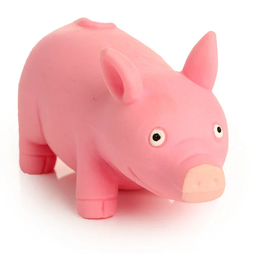 Pink stretchy squeezy pig toy from an angled view, showing its ears, black and white eyes, snout, and small curly tail.