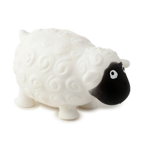 Side view of a white squeezy sheep toy featuring a black face and textured body.