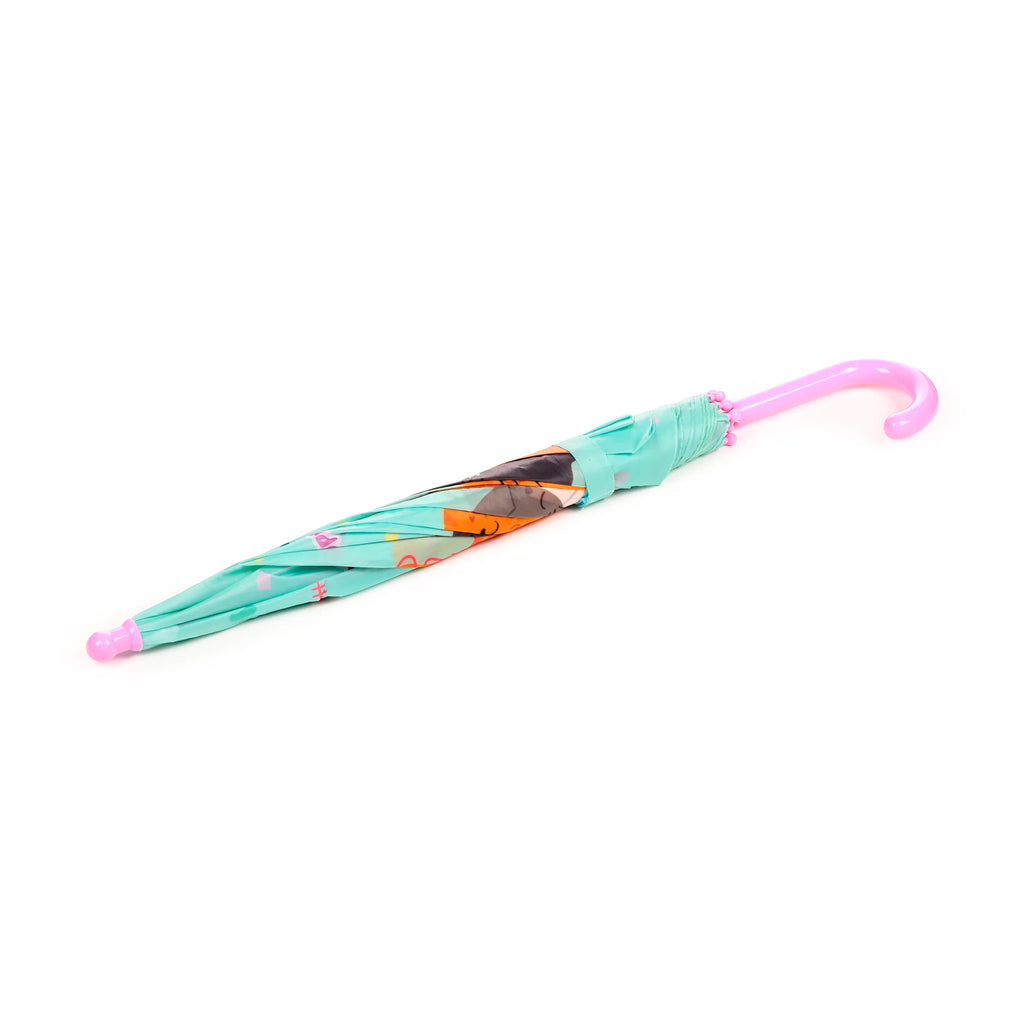 Angled view of a closed kids' umbrella, featuring an aqua canopy with colourful cat designs, a pink hooked handle, and a pink tip.