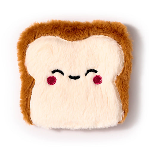 Front view of a plush, cream and brown toast heat pack, featuring an embroidered happy face with black eyes, smiling mouth, and pink cheeks, on a white background.
