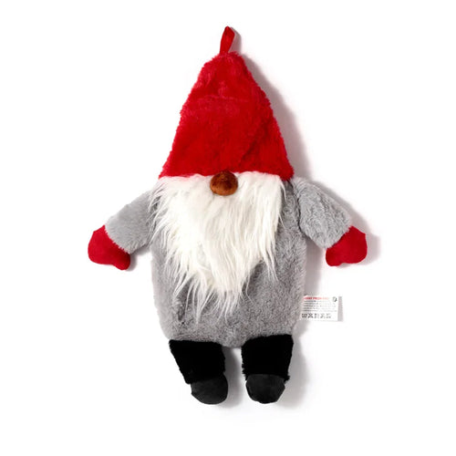 Front view of a hot water bottle with a plush Gonk cover. Features a red pointed hat, white beard, brown nose, grey body, red hands, and black feet.