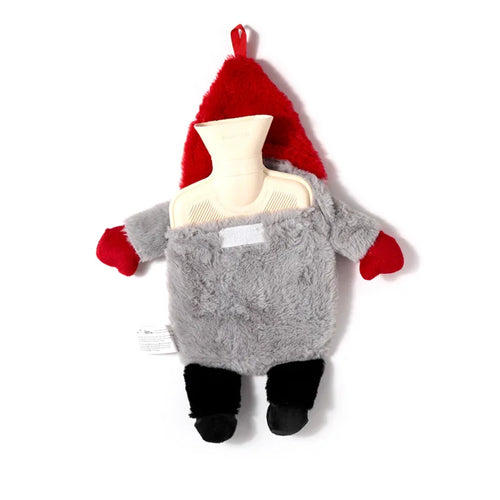 Front view of a hot water bottle featuring a grey plush Gonk cover with a red pointed hat, red mitten arms, and black feet, revealing the beige bottle spout.