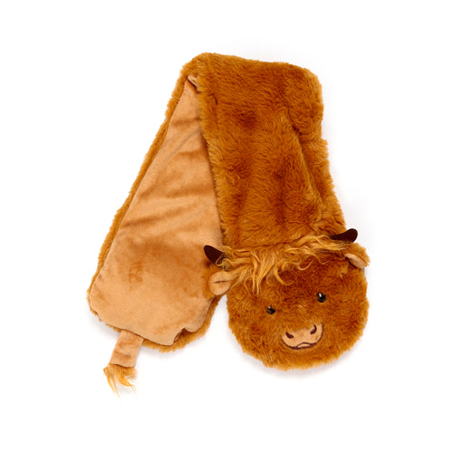 Overhead view of a ginger Highland Coo neck warmer, showing its plush, shaggy face with horns and a softer fabric underside.