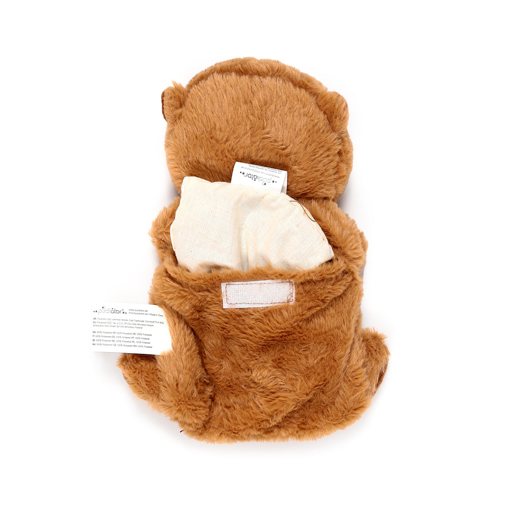 Rear view of a brown plush capybara heat pack, featuring an open back pocket revealing a cream-coloured removable inner pouch, on a white background.