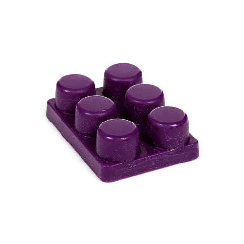 Angled view of a deep purple wax melt block with six rounded wax segments.