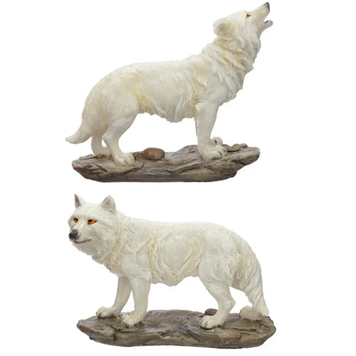 Two white wolf figurines on rocky bases. One wolf howls upwards, showing amber eyes, while the other stands looking forward. Both have textured fur details.