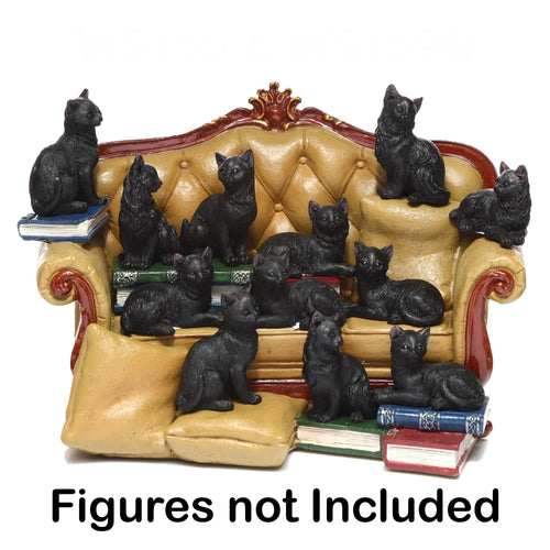 Front view of an ornate, golden sofa tiered display stand with red and gold trim and miniature book tiers, designed for black cat trinkets.