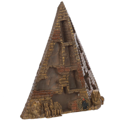 Novelty pyramid display stand with brick-effect finish and gold highlights, featuring integrated display shelves, Egyptian-themed carvings including a sphinx, seated figures, and a scarab beetle at the base, angled view.