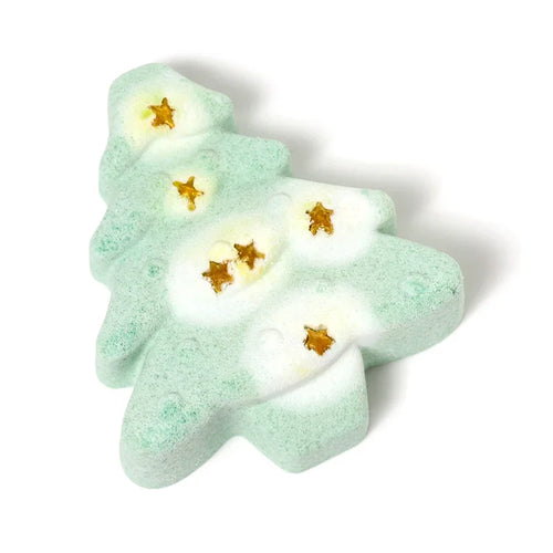 Front view of a green Christmas tree shaped bath bomb with white snow details and gold star accents, set against a white background.