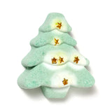 Front view of a handmade green Christmas tree shaped bath bomb with white highlights and gold star embellishments.