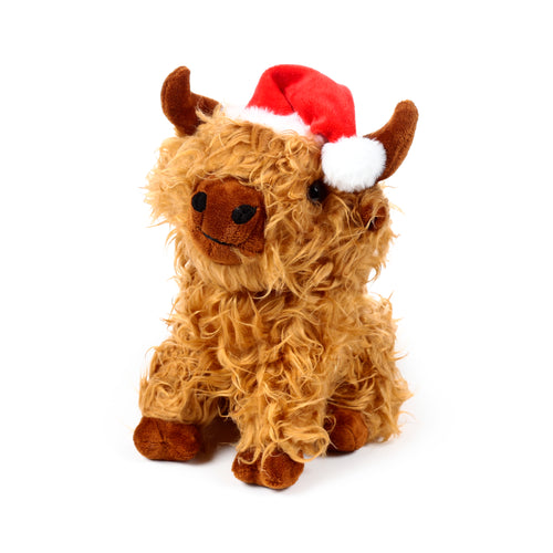Front view of a plush Christmas Highland Coo door stop, featuring shaggy light brown fur, small brown horns, black eyes, a stitched smile, and a festive red Santa hat with white trim and pom-pom.