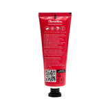 Angled view of a red moisturising hand cream tube, 75ml, with a black cap. The back of the tube is visible, showing 'Clementine Moisturising Hand Cream' and detailed product information.