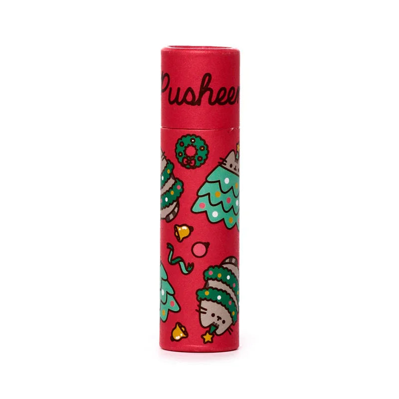 Front view of a red paper stick lip balm featuring Christmas Pusheen the cat designs, including trees, wreaths, and bells.