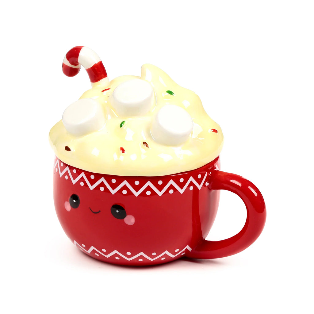 Angled front view of a red ceramic hot chocolate lidded mug with a cute face and white patterned band, featuring a cream whipped cream shaped lid with white marshmallows, colourful sprinkles, and a red and white candy cane.