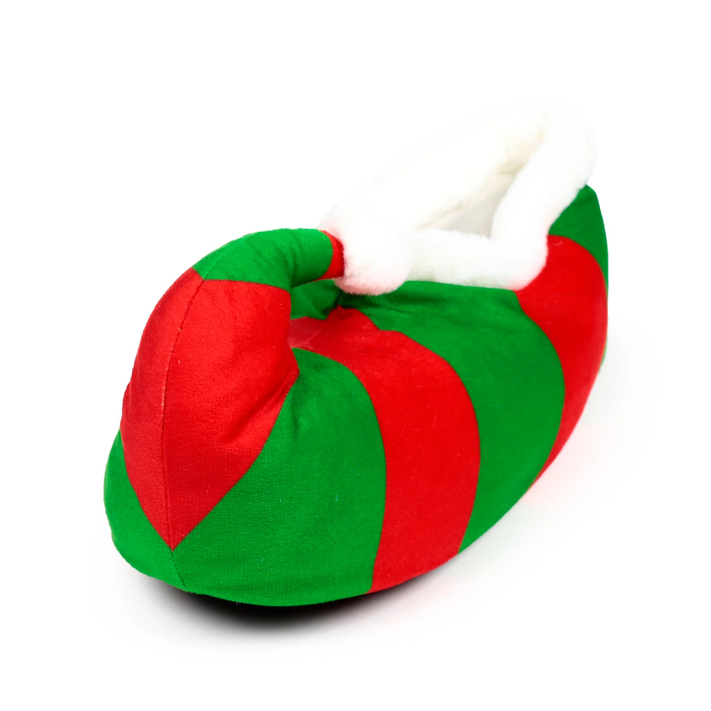 A plush Christmas elf slipper, featuring bright red and green stripes and a soft white fluffy lining, seen from an angled perspective.