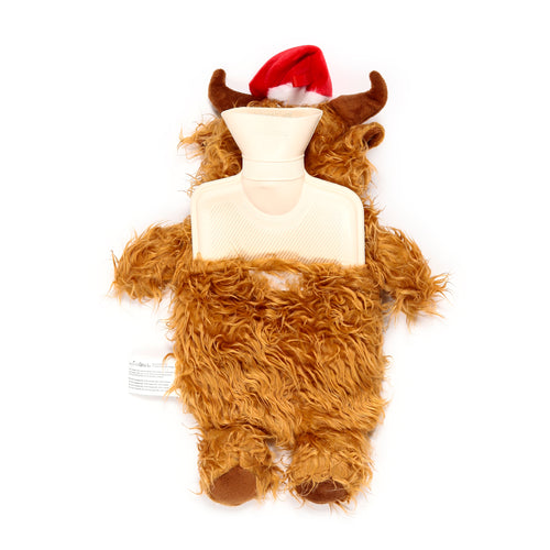 Hot water bottle with a fluffy brown Highland Coo plush cover, featuring soft horns and a red Santa hat. The cream rubber bottle is partially visible at the neck.