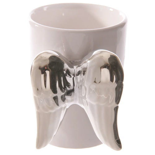 White ceramic mug with a silver angel wings shaped handle, shown clearly on a white background.