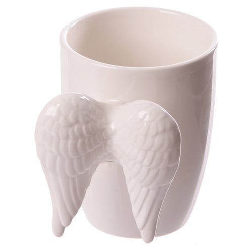Angled view of a white ceramic mug with an angel wings shaped handle, featuring feather detailing.