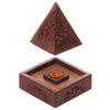 Angled view: dark brown Sheesham wood pyramid incense holder with separated flower fretwork lid and carved base revealing metal cone holder.