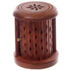 Angled view of a Sheesham wood carved barrel incense cone burner, featuring a floral design on its top and diamond-shaped perforations on the cylindrical body, with a small brass knob for the door.