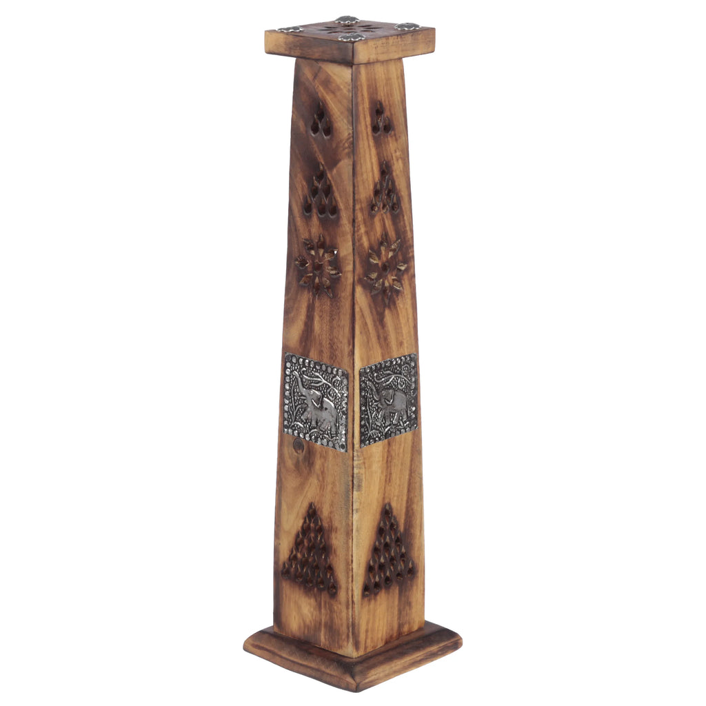 Angled view of a mango wood ashcatcher incense holder tower, designed for sticks and cones, featuring silver elephant inlays and decorative carved patterns on its sides.