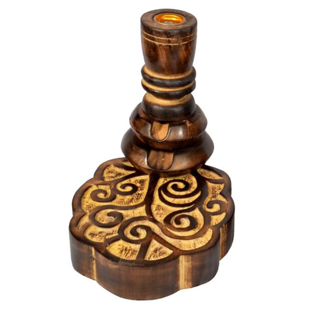 Angled view of a dark brown mango wood backflow incense burner, featuring a turned pillar with a golden incense holder, a tiered middle section, and a carved, lobed base with swirling patterns.