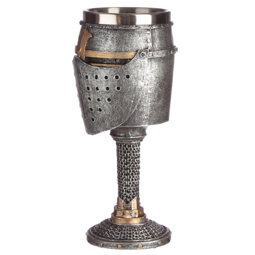 Front view of a decorative medieval helmet and chain mail goblet, showcasing its silver-grey distressed finish and gold accents. The cup features a perforated visor design, and the stem and base have an intricate chain mail texture, with a visible stainless steel lining inside the goblet.