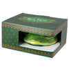 Angled view of a green tree frog head shaped ceramic mug, with red eyes, partially visible inside its retail packaging.