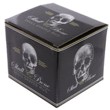Angled view of a black packaging box for a mug, featuring white skull graphics and 'Skull Shaped Mug' text.