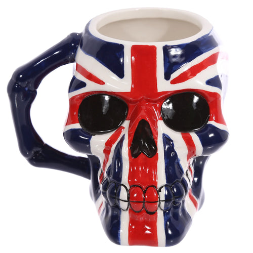 Front view of a ceramic UK Flag Skull Head mug, featuring a red, white and blue Union Jack design with black eye sockets and a dark blue handle.