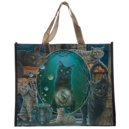 Front view of a rectangular reusable shopping bag featuring a detailed Lisa Parker 'Magic Cat Montage' print. The design showcases several black and grey cats amidst mystical elements like a crystal ball, cauldron, and spellbooks, with natural woven handles.
