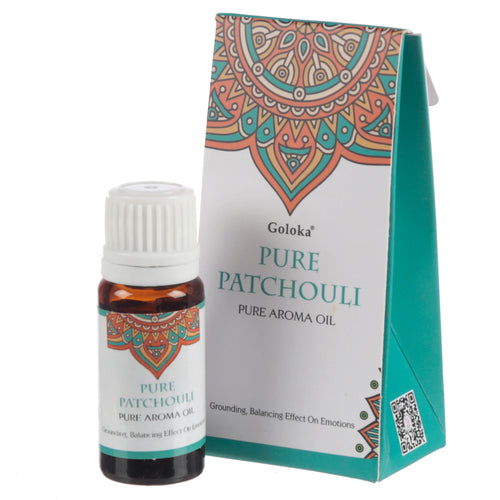 Angled view of Goloka Pure Patchouli aroma oil, featuring a small amber bottle with a white cap and a teal cardboard box displaying a colourful mandala pattern and product text.