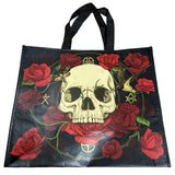 Front view: Black shopping bag with skull, red roses, green vines, moth, bird, and gold symbols design. Black handles.