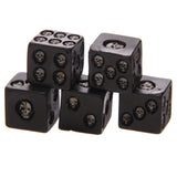 Angled view of a pack of five black skull dice, featuring debossed skull designs on each face instead of pips, presented on a white background.