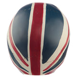 Overhead view of a distressed skull ornament painted with a Union Flag design in dark blue, red, and cream.