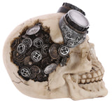 Angled view of a bone-coloured steampunk skull ornament, featuring metallic goggles on the forehead and exposed gears and cogs on the top left side.