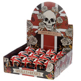 Angled view of multiple Union Flag Skull Head Decorations, each featuring a red, white, and blue Union Flag design, presented in a decorative retail display box adorned with Union Jack patterns, skulls, and rose motifs.