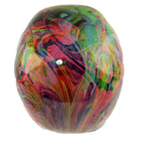 Angled view of a rainbow marble effect skull ornament, showcasing its glossy surface and vibrant, swirling red, green, blue, and yellow colours.