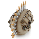 Steampunk Style Skull with Bullet Mohican ornament, angled to showcase its cream-coloured surface with silver bullets and gold tips, alongside intricate silver and gold gear and piping details on the side.