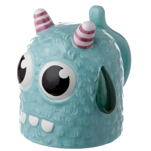 An angled view of a blue ceramic monster shaped upside down mug, featuring a textured body, large black and white eyes, pink and white striped horns, and white teeth, with a dark green tear drop detail.