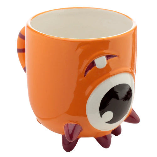 Angled view of an orange ceramic upside down monster shaped mug, featuring a large eye, open mouth, and small maroon feet.