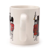 Side view of a white porcelain mug, showcasing its handle and part of the London-themed design featuring a Stormtrooper in a Queen's Guard uniform and another in a Beefeater uniform.