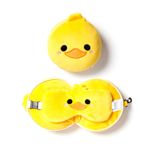 Yellow plush duck travel pillow and eye mask set, depicted folded as a round duck character with eyes and beak, and also opened to reveal the U-shaped pillow and matching duck eye mask, against a white background.