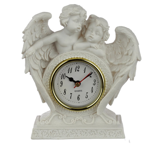 Front view of an ornate, cream-coloured resin cherub mantle clock, featuring two winged angels embracing above a gold-trimmed clock face with black numerals. Intricate scrollwork decorates the base.