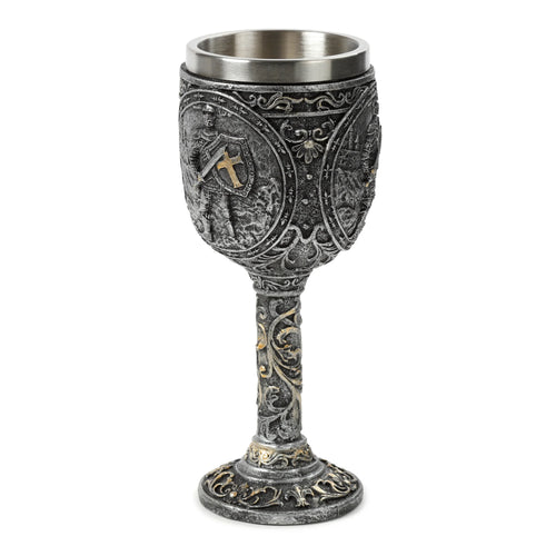 Decorative goblet with an antique silver-grey finish and gold accents, displaying an embossed design of a knight with a golden cross shield, castle details, ornate scrollwork, and fleur-de-lis motifs, featuring a stainless steel inner cup.