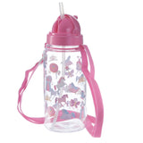 Angled view of a clear children's water bottle with a pink lid, an integrated straw, and a pink carry strap. The bottle is decorated with pastel-coloured illustrations of unicorns, crowns, carriages, and butterflies.