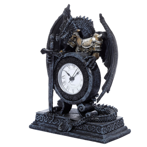 Front view of a Gothic Armoured Dragon Mantle Clock, featuring a dark dragon figure with gold armor accents holding a sword, a white clock face with Roman numerals, and an ornate base.